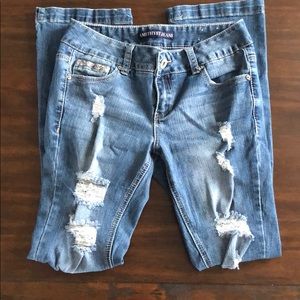 Bootcut ripped blue jeans